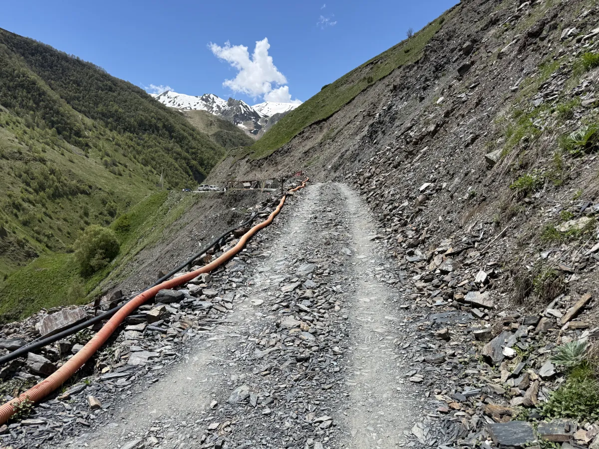 Rough track cut through a loose slate scree slope